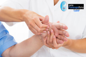 Close-up Of A Person Receiving Palm Massage By Physiotherapist