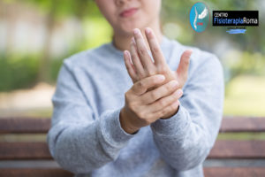 Woman has hand pain at park